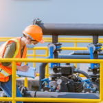 Worker,Under,Checking,The,Waste,Water,Treatment,Pond,Industry,Large